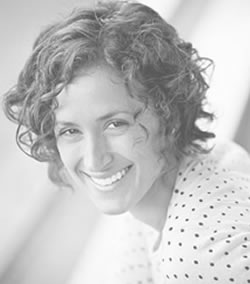 woman laughing after paying off her home